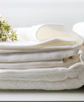 Folded Laundry At Laundromat With Florals 1920X650